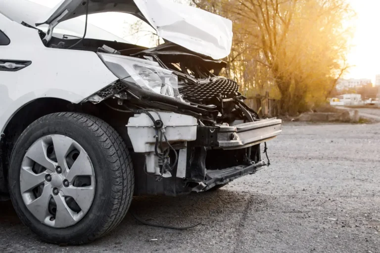 Damaged front bumper of a car after a crash in Florida
