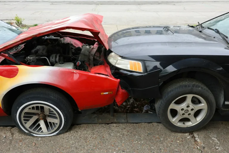 Two cars after a front-end collision, the kind of crash that leads to a Florida crash report